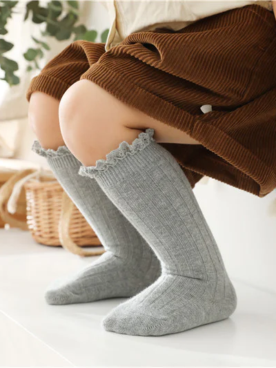 Little girls cable-knit ribbed knee-high socks with eyelet ruffle trim - Mia Belle Girls